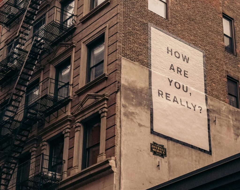 how do you really feel banner on side of building