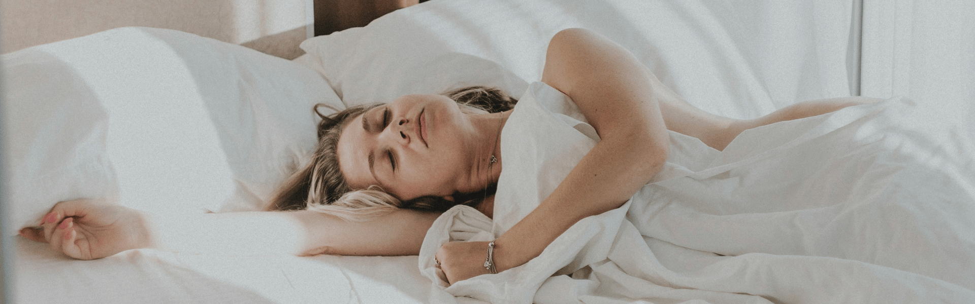 sleeping lady in bed blog banner